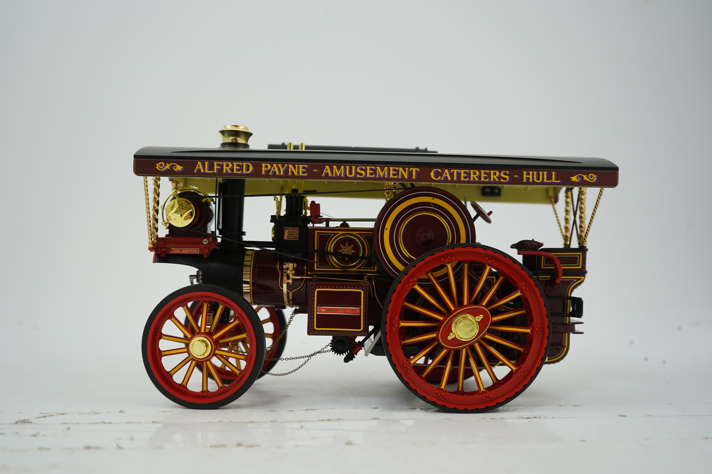 A Midsummer Models Ltd. 1:24 scale model of a Burrell Showman’s Engine, The White Rose of York, in ‘Alfred Payne - Amusement Caterers - Hull’ livery, missing the original card box, but with an oak and Perspex display cas